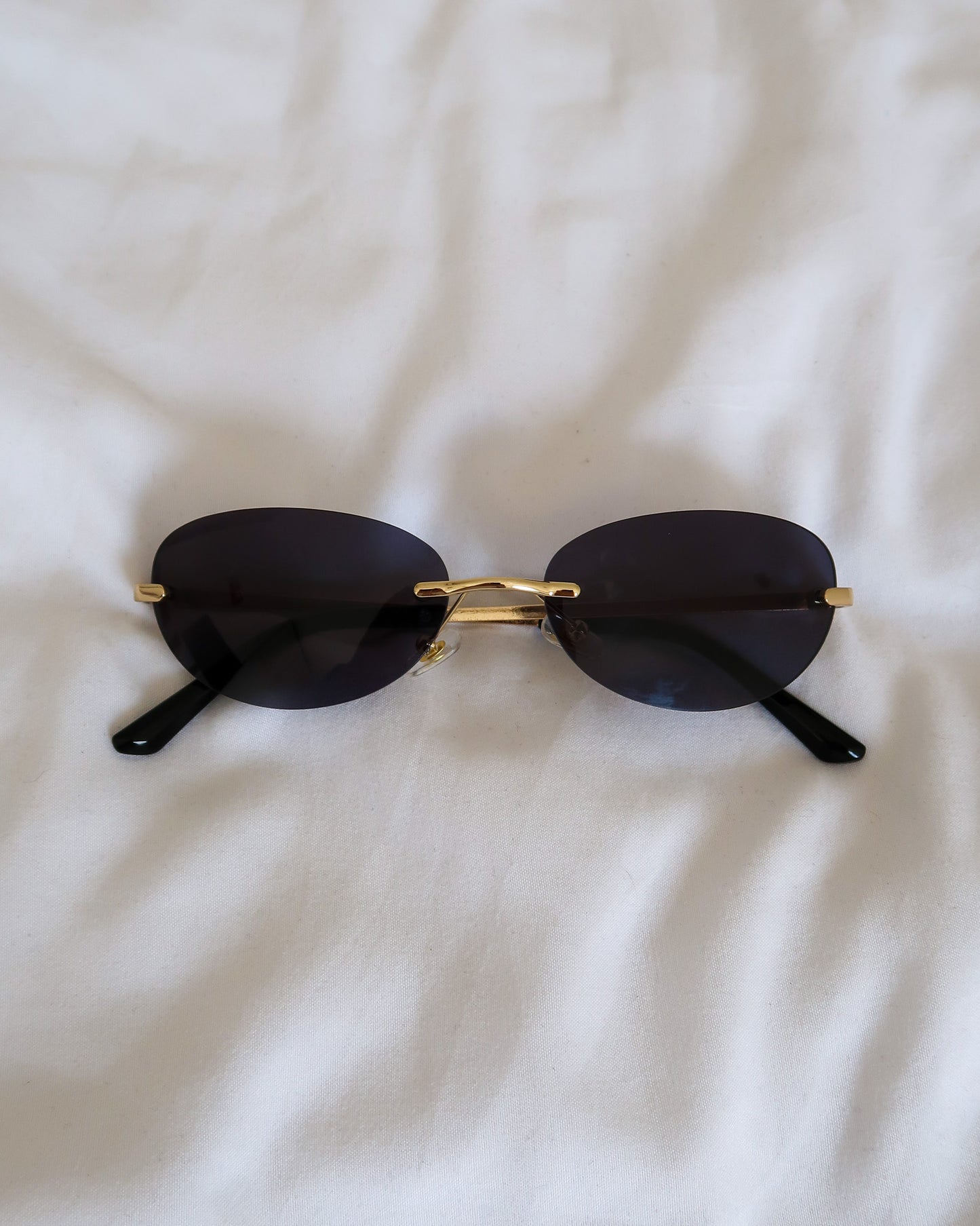 Black Rimless Sunglasses